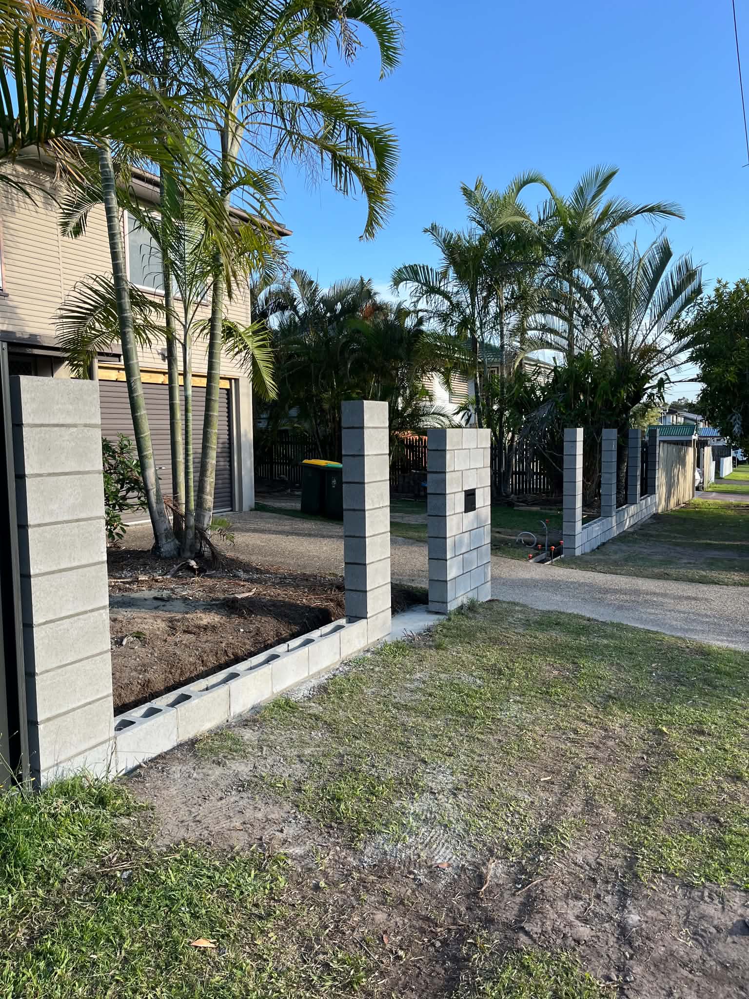 Block front fence during construction