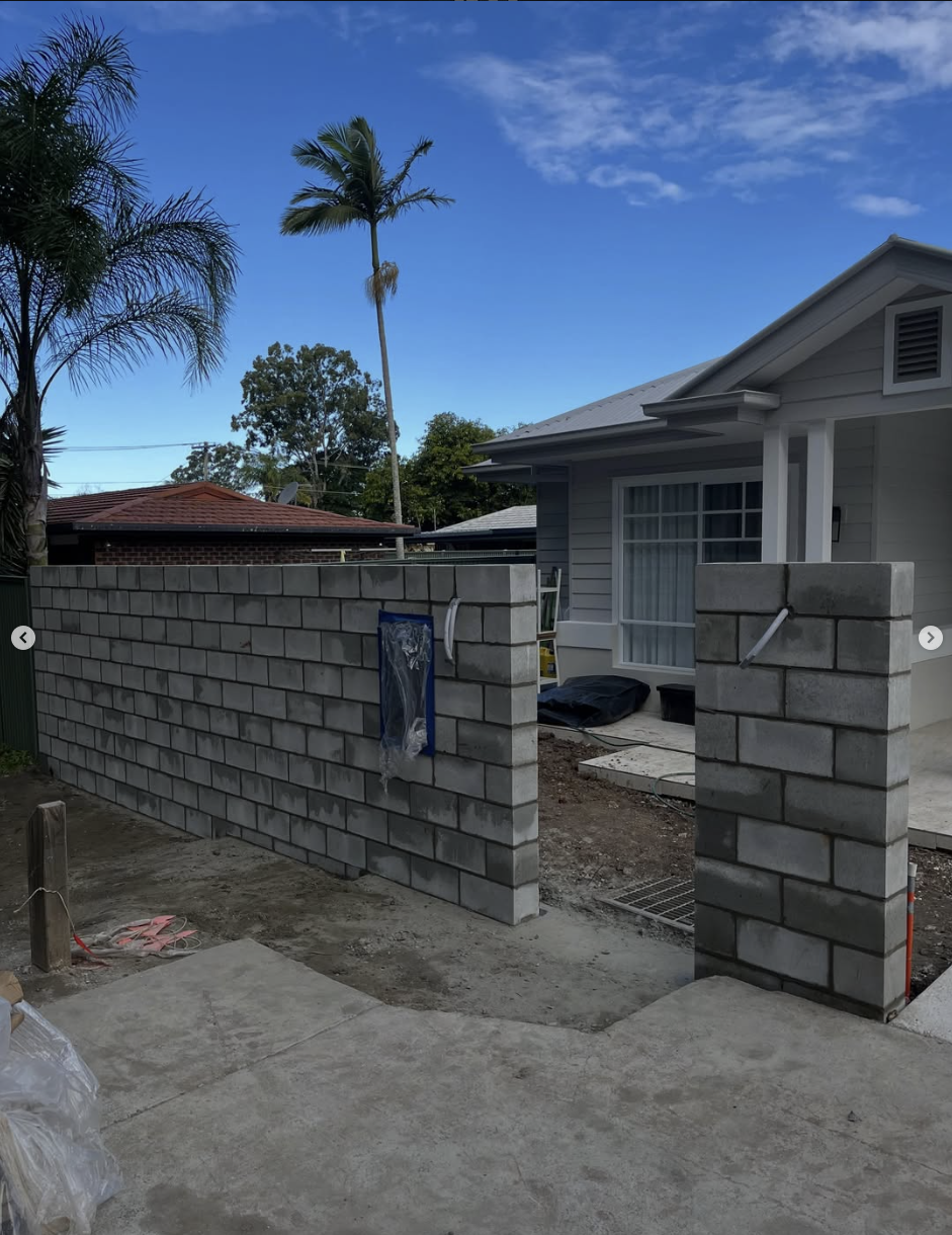 Block front fence during construction